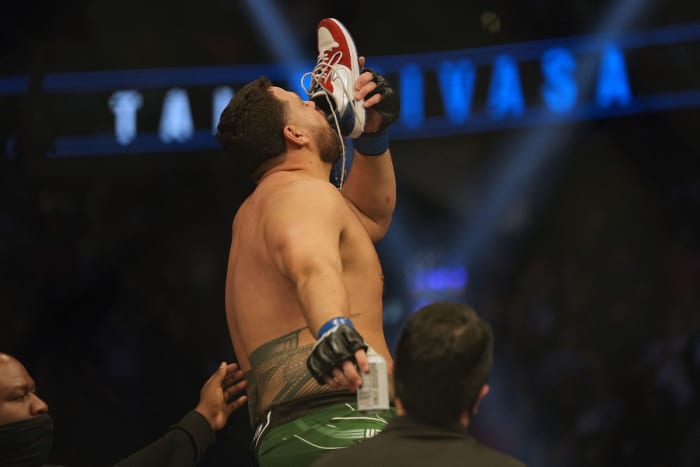 Tai Tuivasa celebrates a victory with his signature "shoey."